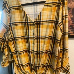 Nice summer, yellow plaid blouse with a nodded bowl